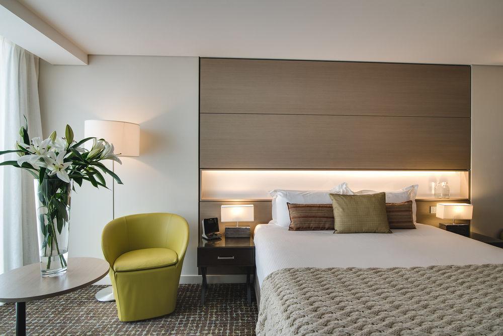 The Point Brisbane Hotel Exteriör bild A bedroom at the hotel