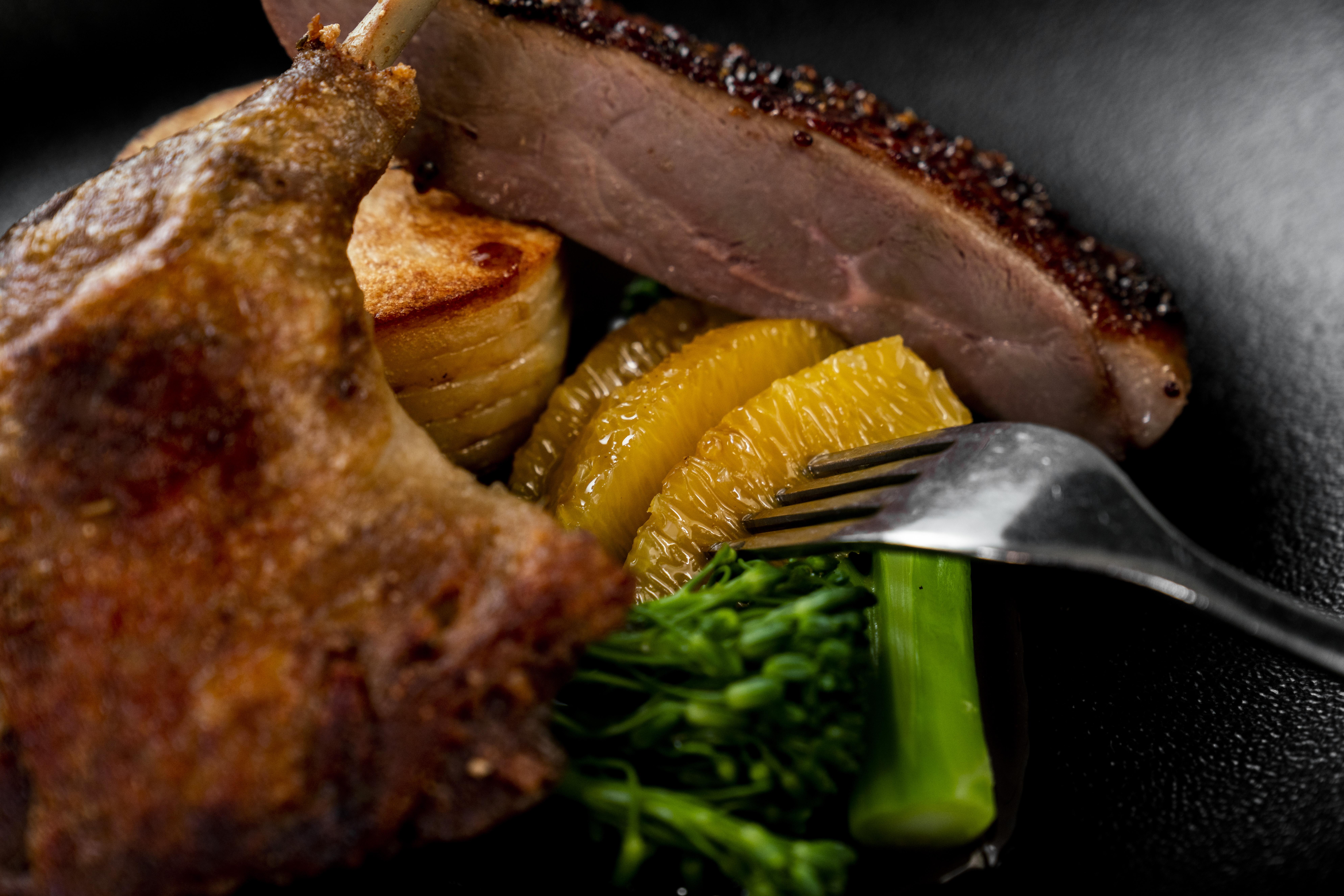 The Point Brisbane Hotel Exteriör bild A duck confit with orange and vegetables